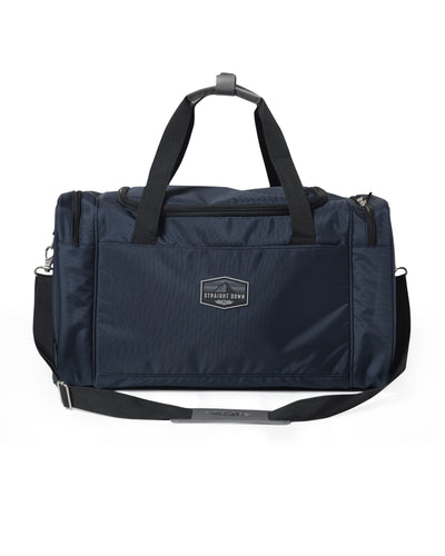 Straight Down Montana Duffle Bag in New Indigo, front view featuring a navy nylon duffle bag with a Straight Down mountain badge logo patch, top zip closure, dual carry handles, front zip pocket, and adjustable black crossbody strap