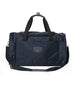 Straight Down Montana Duffle Bag in New Indigo, front view featuring a navy nylon duffle bag with a Straight Down mountain badge logo patch, top zip closure, dual carry handles, front zip pocket, and adjustable black crossbody strap