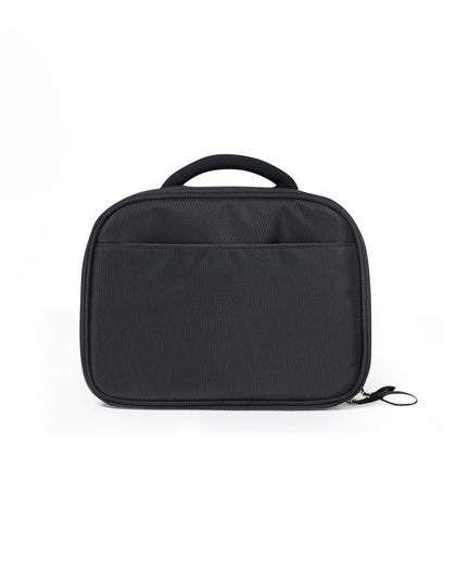 Straight Down Montana Dopp Bag in Black, back view featuring a black toiletry bag with a back slip pocket, top carry handle, and zip closure pull