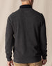 Men's Links Crewneck Sweater in Charcoal Heather, back on-model view featuring a dark heathered gray textured knit fabric with a tonal embroidered Straight Down logo at the upper back, styled with a black collared shirt and tan pants