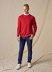 Men's Links Crewneck Sweater in Flag Red, full-length on-model view featuring a bold red textured knit fabric with a crew neckline, styled with a white collared shirt, navy pants, and white shoes