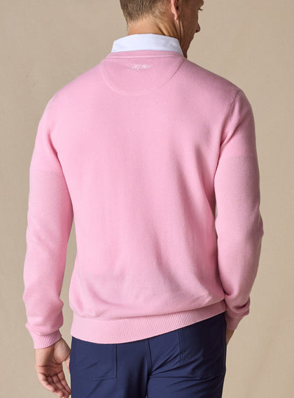 Men's Links Crewneck Sweater in Pink Lemonade, back on-model view featuring a soft pink textured knit fabric with an embroidered Straight Down logo at the upper back, styled with a white collared shirt and navy pants