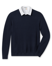Men's Links Crewneck Sweater in New Indigo, flat lay front view featuring a solid navy textured knit body with long sleeves and ribbed cuffs and hem