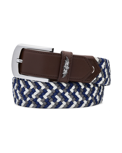 Men's Washington Web Belt in New Indigo, coiled view featuring a navy, grey, and white woven elastic construction with a brown leather keeper, Straight Down logo, and silver rectangular buckle