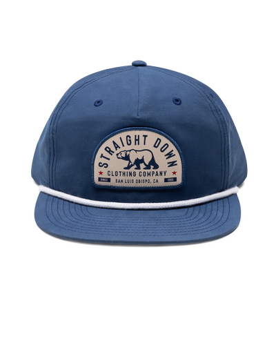 Bear Country Rope Hat in New Indigo, front view featuring a cream and navy arched Straight Down Clothing Company bear patch on the front panel with a white rope detail along the brim