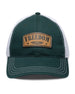 Freedom Hat in Green, front view featuring a forest green structured trucker cap with a leather patch reading "Freedom" and Straight Down logo on the front panel, white mesh back panels, and white contrast stitching on the brim