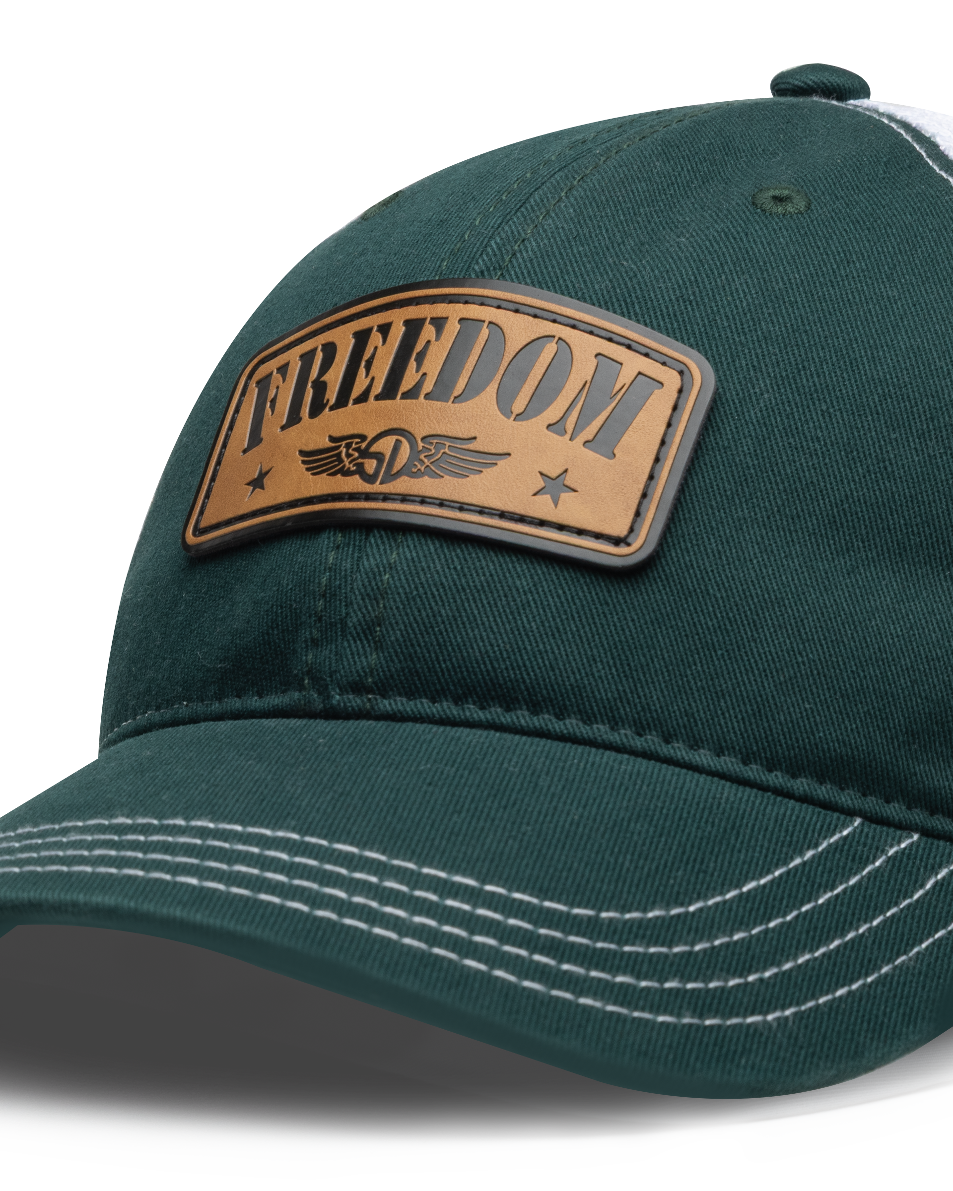 Freedom Hat in Green, close-up front view featuring a tan leather patch reading 