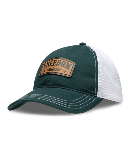 Freedom Hat in Green, side view featuring a forest green and white mesh trucker hat with a leather "Freedom" and Straight Down logo patch on the front panel with white contrast stitching