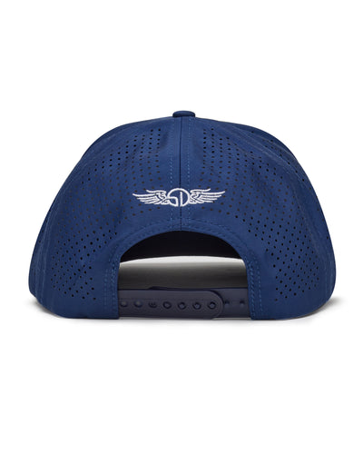 Republic Hat in New Indigo, back view featuring a navy perforated performance cap with Straight Down logo embroidered at the center and a snapback adjustable closure
