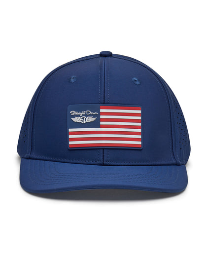 Republic Hat in New Indigo, front view featuring a navy structured performance cap with a red, white, and blue American flag rubber patch and Straight Down logo on the front panel, with perforated side panels
