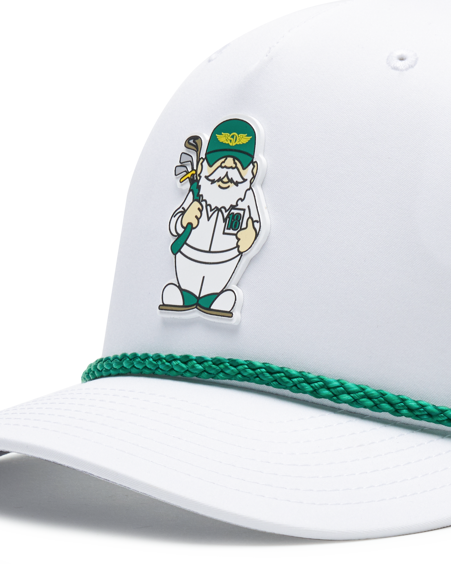 Close up of a white cap featuring a green braided trim along the edge of the brim and a small illustrated golf caddie gnome on the front.