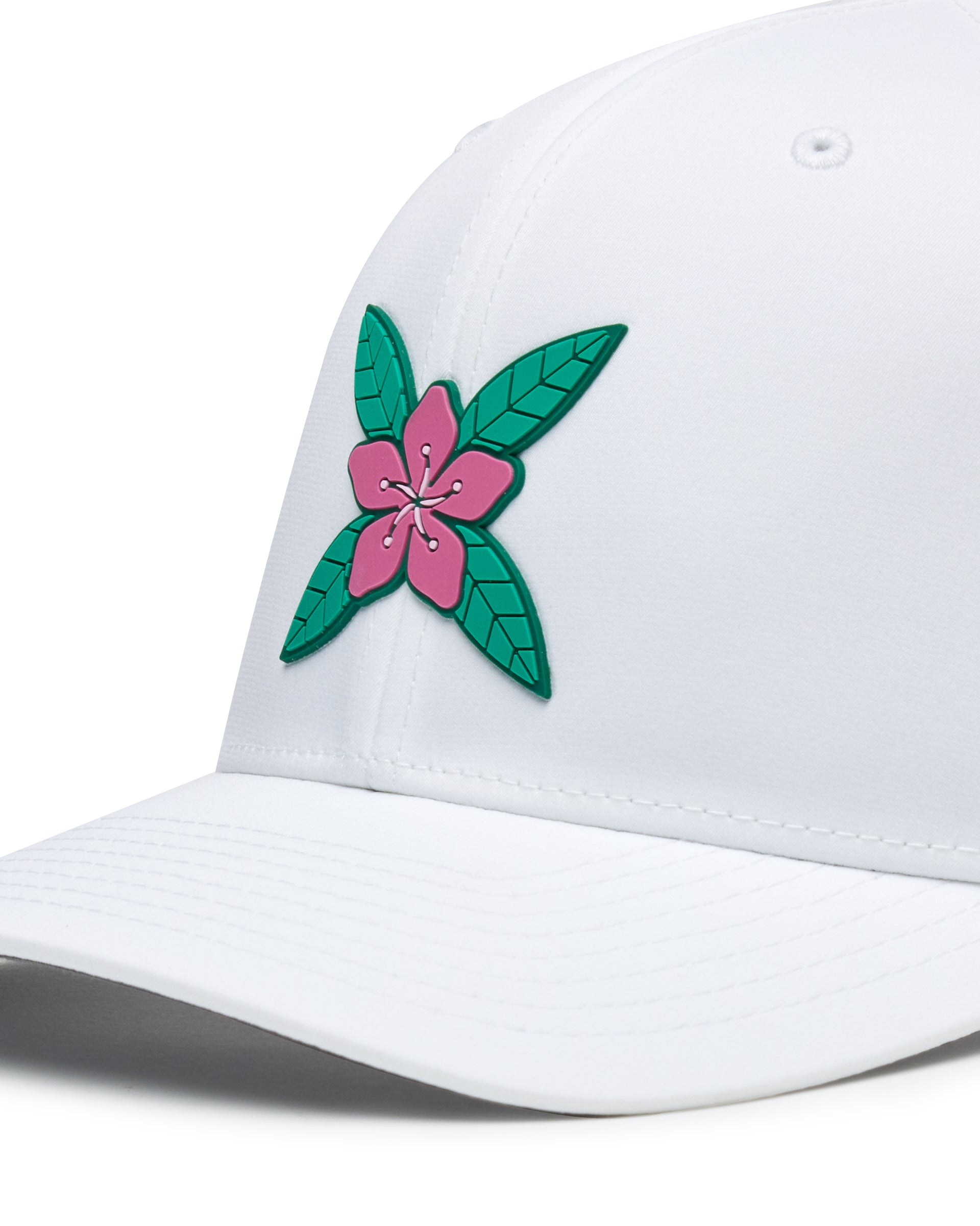 Close-up of the Azalea Hat in White featuring a pink azalea flower logo