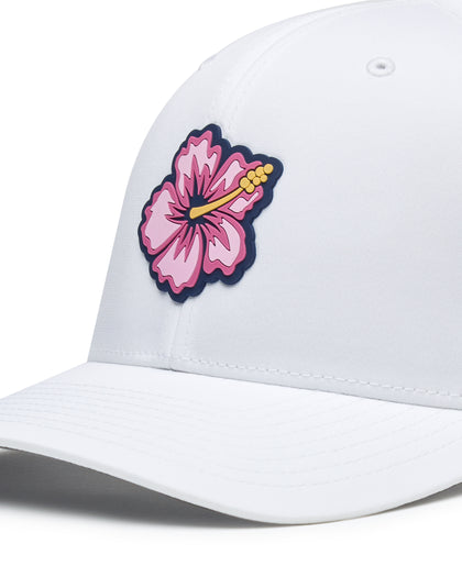 Straight Down Hibiscus Hat in White, close up front view highlighting the pink hibiscus flower rubber patch detail on the front panel