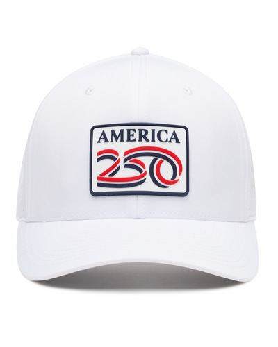 A white structured baseball cap with a curved brim, featuring a front patch that reads 'AMERICA 250' in navy, red, and white. The cap has perforated side panels for ventilation.
