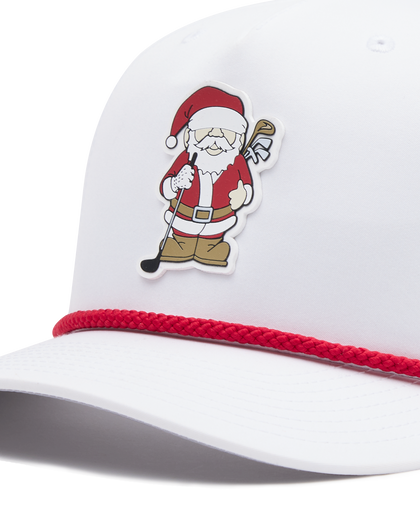 Close-up of the Holiday Rounds Hat in White, highlighting the Santa Claus golfer patch and red braided rope detailing along the brim.