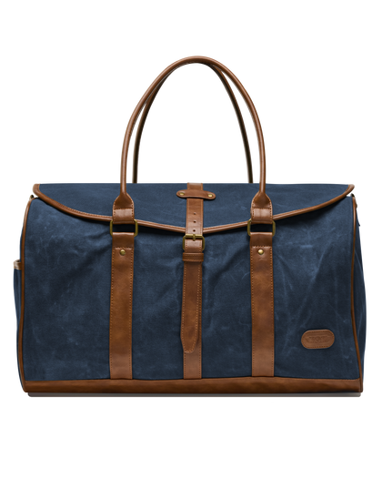 Front view of the Waxed Canvas Duffle Bag in Navy, featuring brown leather handles, leather trim, brass hardware, and a buckle-secured flap closure.