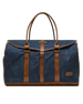 Front view of the Waxed Canvas Duffle Bag in Navy, featuring brown leather handles, leather trim, brass hardware, and a buckle-secured flap closure.