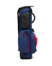 Straight Down Lux Carry Stand Bag in Navy Red, side profile view featuring black hexagon-embossed padded pocket, red zipper trim, rounded lower pockets, and dual carry handle