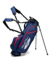 Straight Down Lux Carry Stand Bag in Navy Red, front angle view featuring white Straight Down wing logo, red zipper accents, American flag patch, dual shoulder straps, and deployed kickstand legs