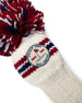 Straight Down Pom Pom Driver Headcover in Red White Blue, close-up view featuring the Straight Down Golf Company Since 1989 embroidered patch and red and navy stripe knit detail