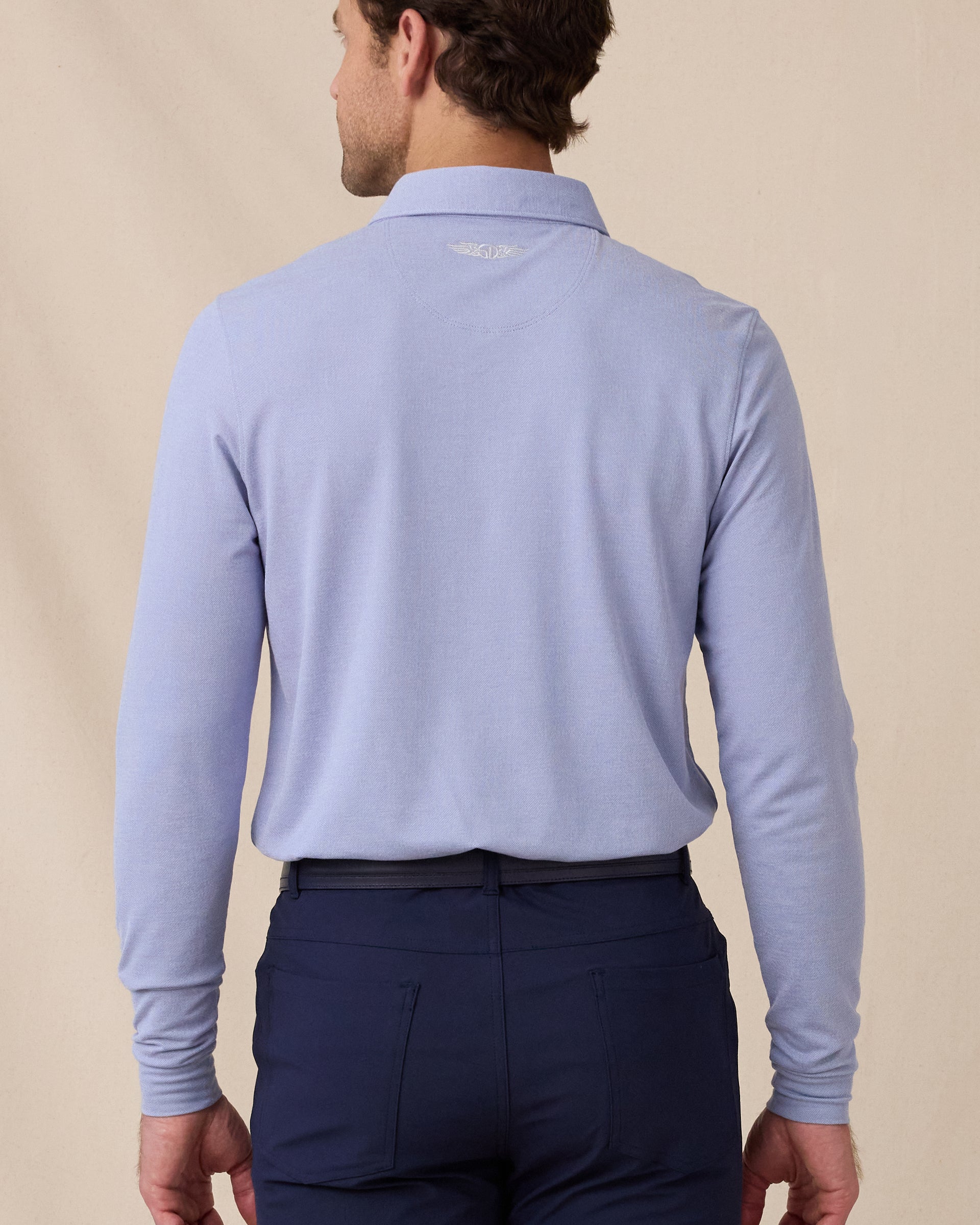 Back view of the Cambridge Long Sleeve Polo in Chambray Blue