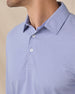 Close-up of the Cambridge Long Sleeve Polo in Chambray Blue highlighting the structured collar and refined knit texture