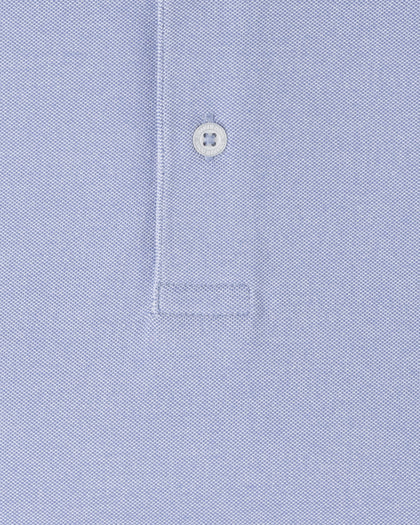 Cambridge Long Sleeve Polo in Chambray Blue featuring a soft performance knit fabric with subtle texture and a smooth, lightweight feel