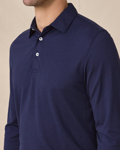 Close-up of the Cambridge Long Sleeve Polo in New Indigo highlighting the structured collar and refined knit texture