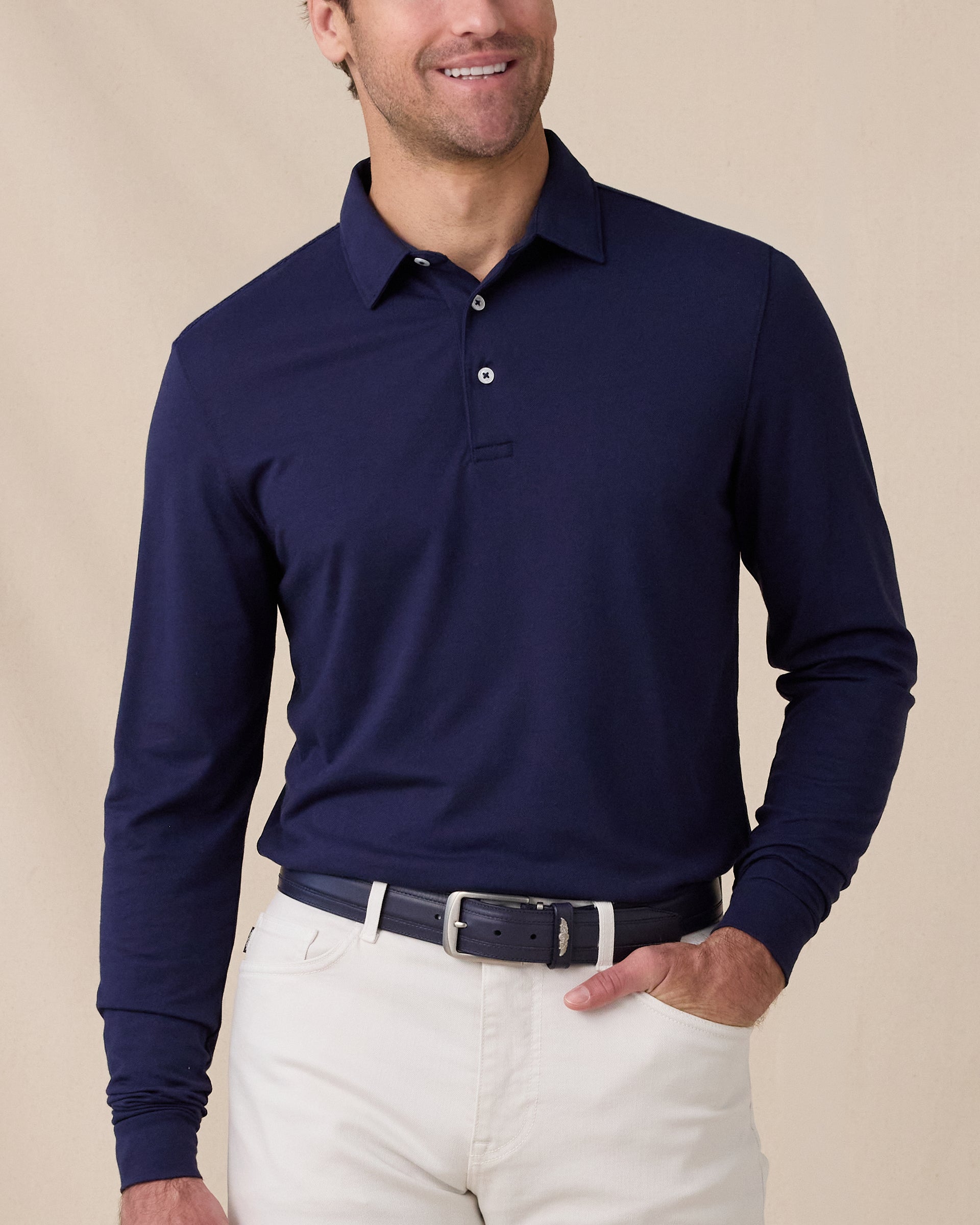Model wearing the Cambridge Long Sleeve Polo in New Indigo