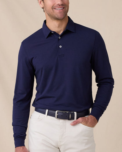 Model wearing the Cambridge Long Sleeve Polo in New Indigo