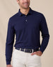 Model wearing the Cambridge Long Sleeve Polo in New Indigo