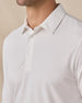 Close-up of the Cambridge Long Sleeve Polo in White featuring the structured collar, oxford pique knit texture, and button placket