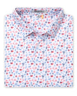 Grillin' Polo in White, folded flat lay front view featuring a white base with an all-over scattered print of American flags, watermelon, hot dogs, grills, and fireworks in red and blue tones