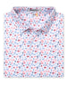 Grillin' Polo in White, folded flat lay front view featuring a white base with an all-over scattered print of American flags, watermelon, hot dogs, grills, and fireworks in red and blue tones
