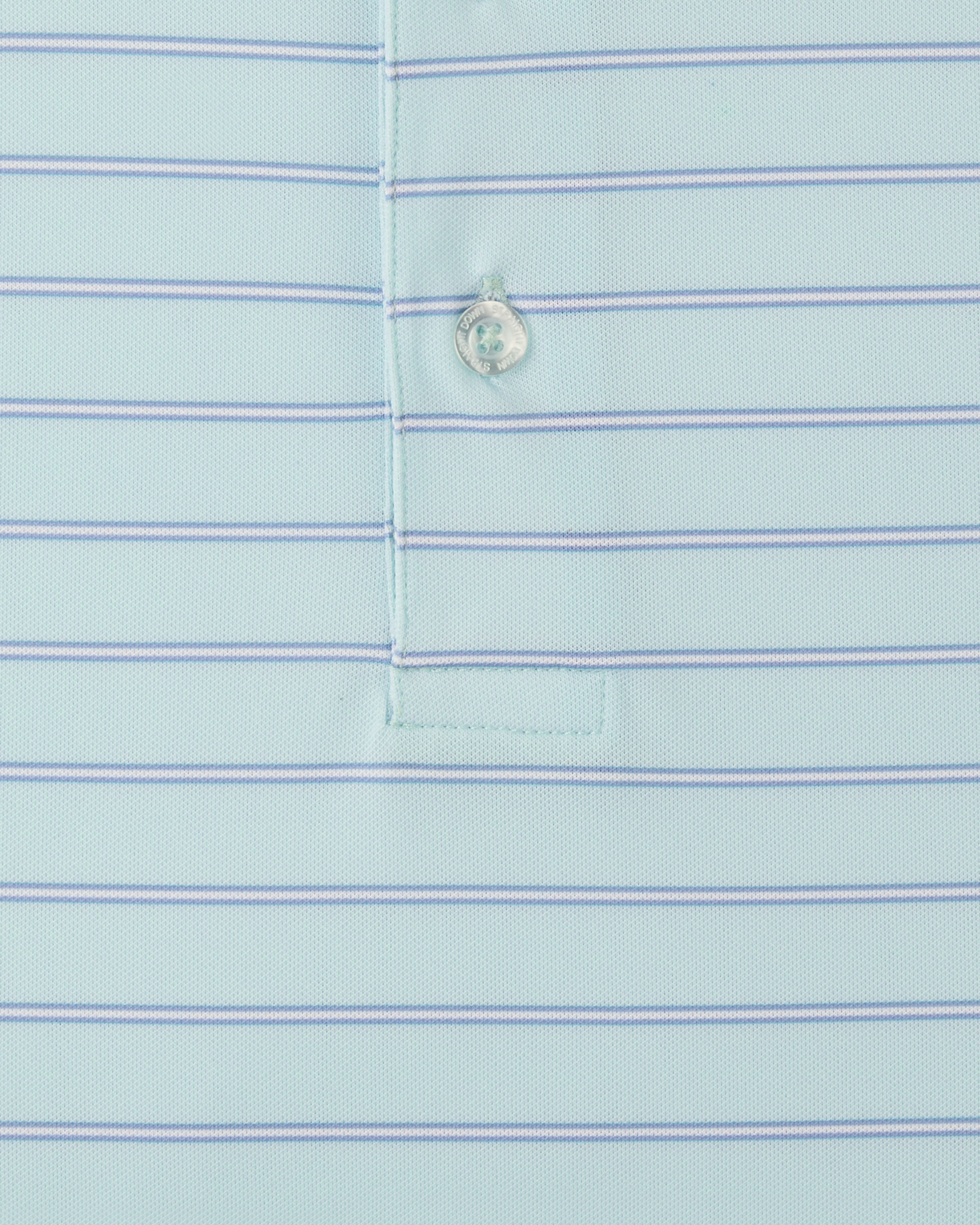 Close-up of the Mint Tea fabric, thin blue stripes and branded button.
