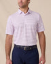 Model wearing the Quintero Stripe Polo in Lilac, a striped performance golf polo