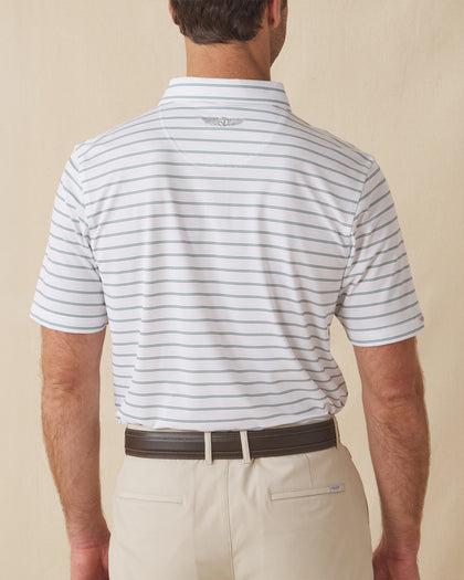 Men's Quintero Stripe Polo in Sage, back model view featuring a white short sleeve polo with horizontal green and sage pencil stripes with the Straight Down logo at the back collar