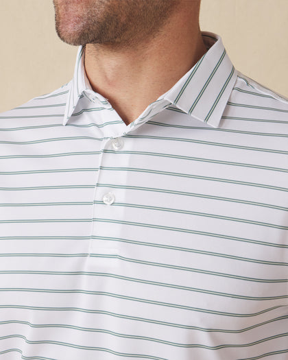 Men's Quintero Stripe Polo in Sage, close-up model view featuring the collar and button placket detail of a white short sleeve polo with horizontal green and sage pencil stripes
