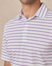 lose-up of the Quintero Stripe Polo in Tidal showcasing the self-fabric collar, blue and pink horizontal stripes, and three-button placket