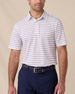 Model wearing the Quintero Stripe Polo in Tidal, a striped performance golf polo with blue and pink horizontal stripes