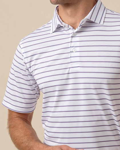 Close-up of white polo with fine purple stripes, featuring a structured collar and button placket