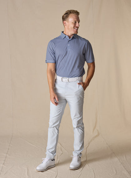 Del Mar Stripe Polo in New Indigo, full-body model styled with light pants