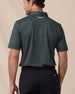 Del Mar Stripe Polo in Dark Forest Green, back lifestyle view on model