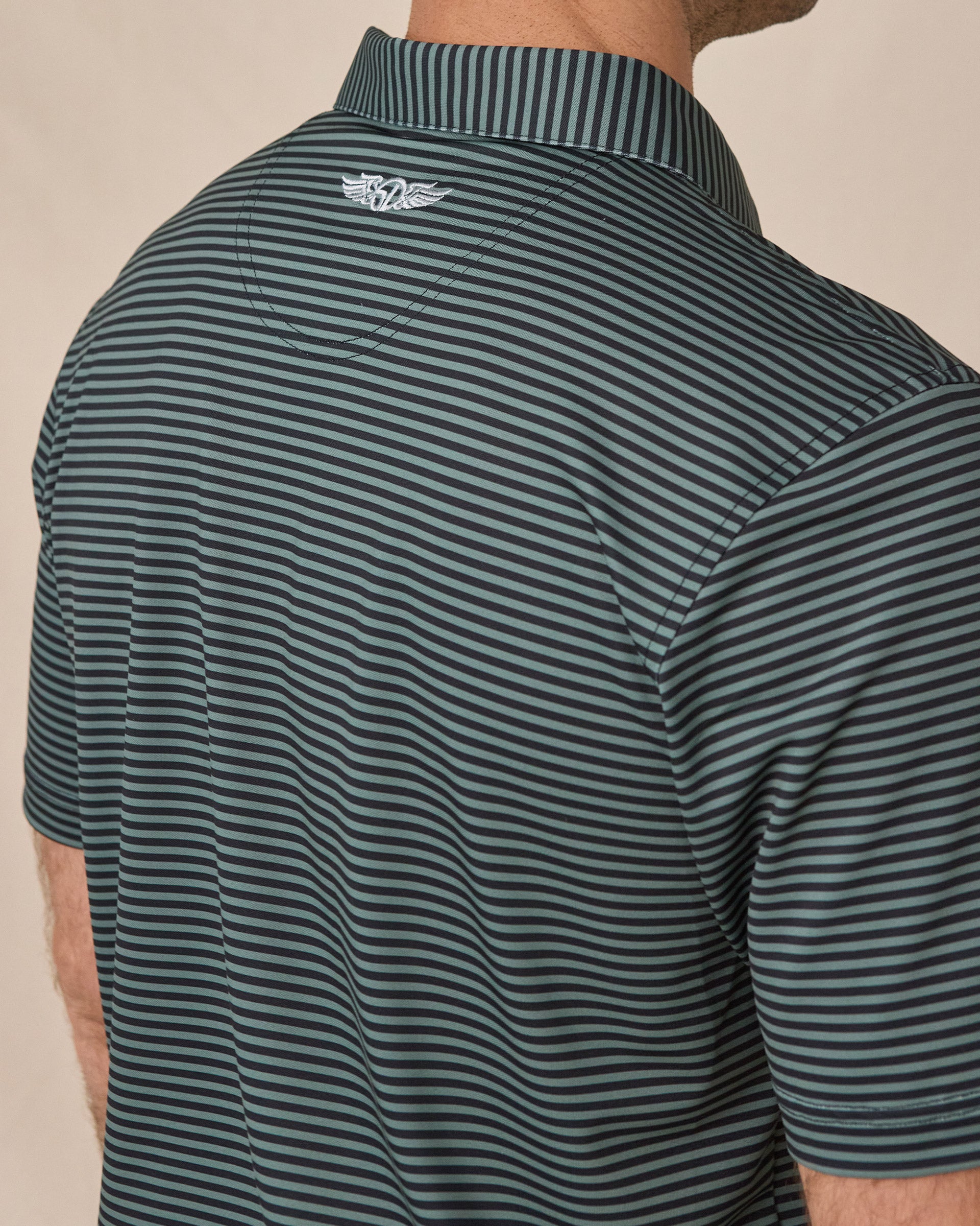 Del Mar Stripe Polo in Dark Forest Green, back logo detail close-up