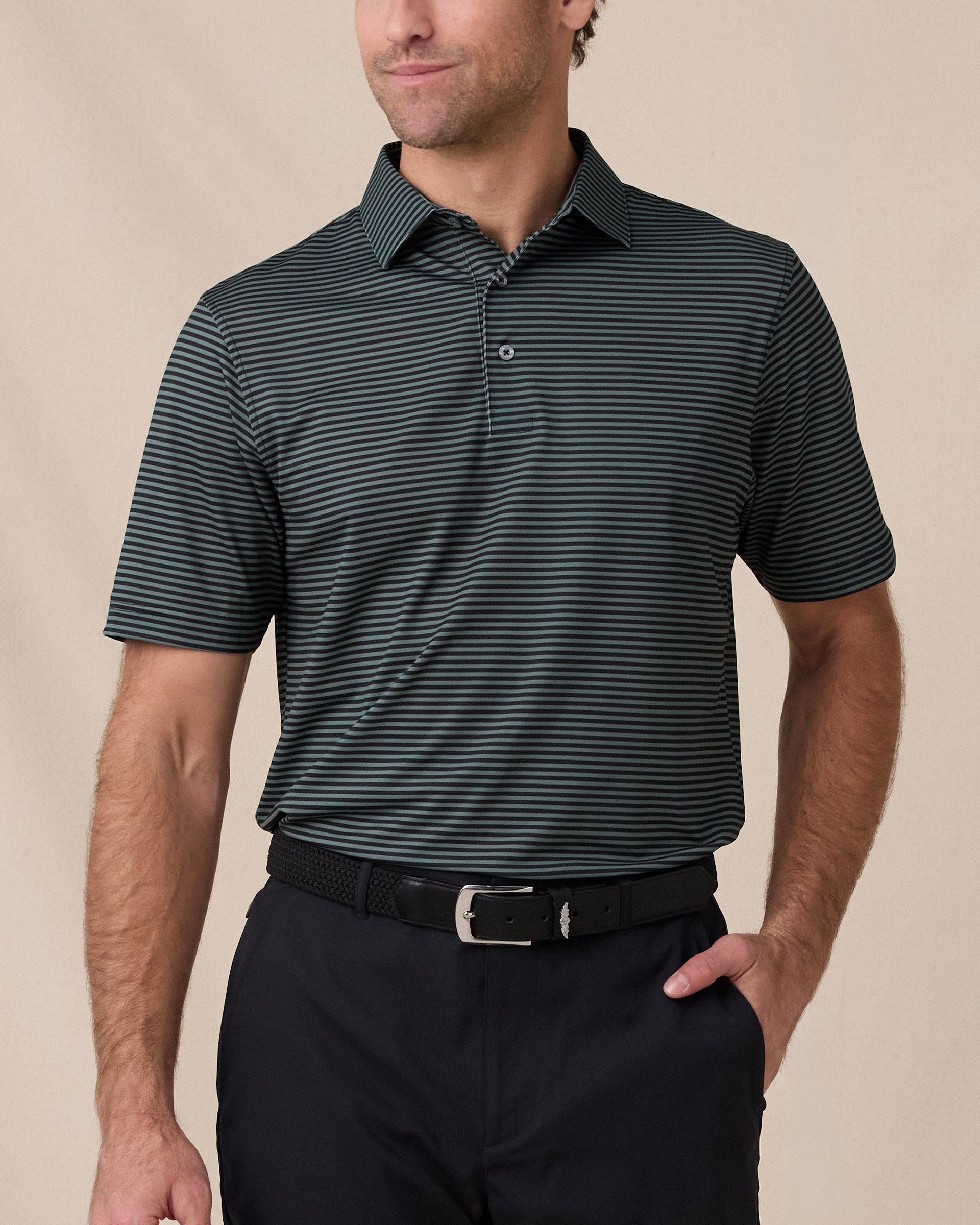 Del Mar Stripe Polo in Dark Forest Green, front lifestyle view on model