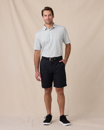 Del Mar Stripe Polo in Herb Green, full-body lifestyle view on model styled with black shorts