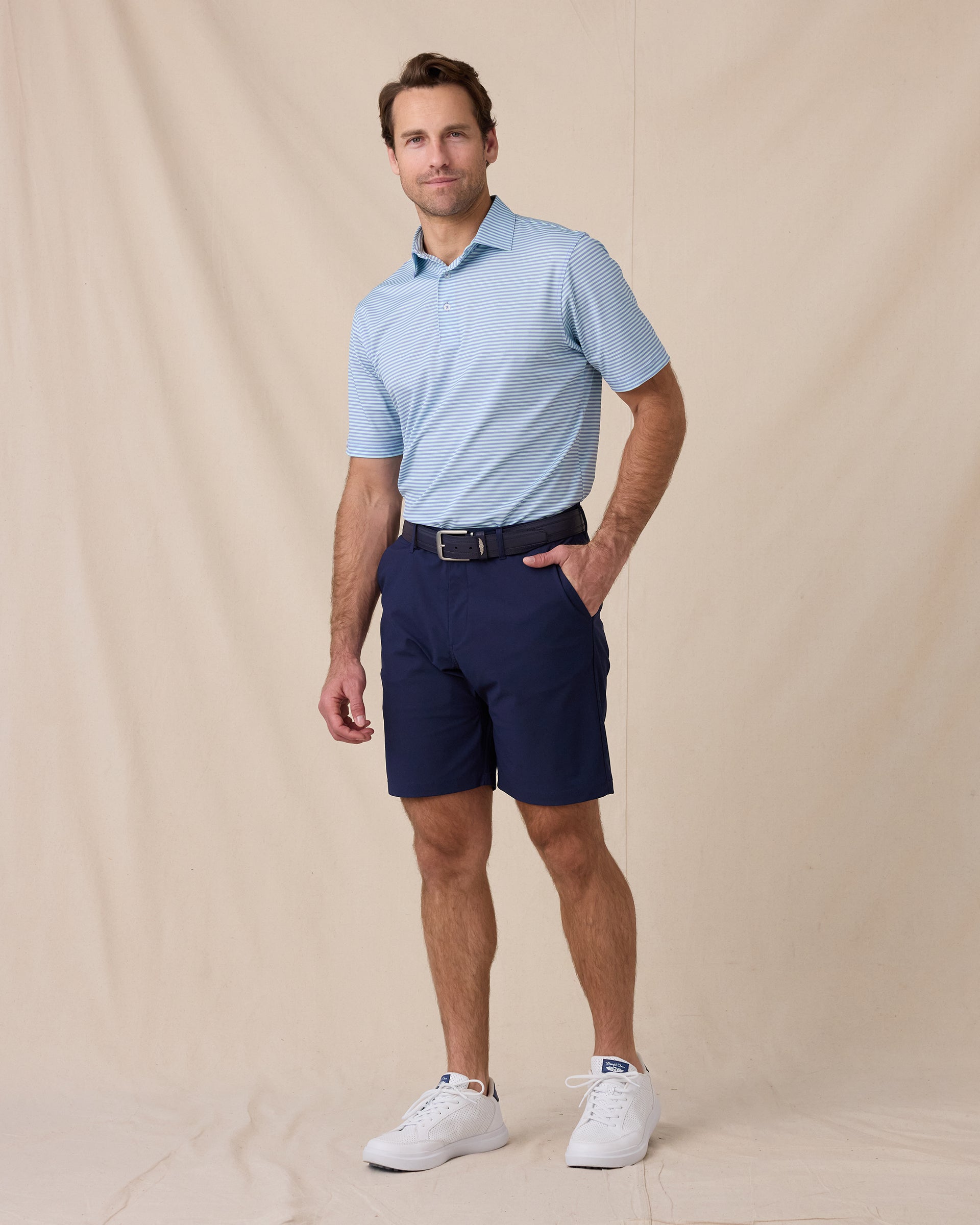 Del Mar Stripe Polo in Mint Tea, full-body lifestyle view on model styled with navy shorts