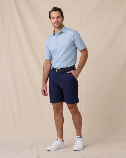 Del Mar Stripe Polo in Mint Tea, full-body lifestyle view on model styled with navy shorts