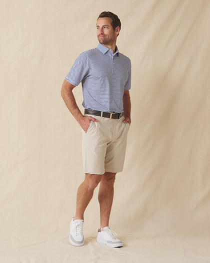 Del Mar Stripe Polo in Moonlight Blue, full-body lifestyle view on model styled with light shorts