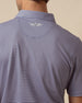 Back view of indigo and lilac striped polo featuring embroidered logo at the collar